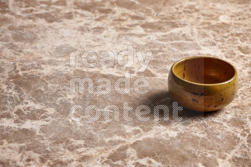 Multicolored Pottery Bowl on Beige Marble Flooring