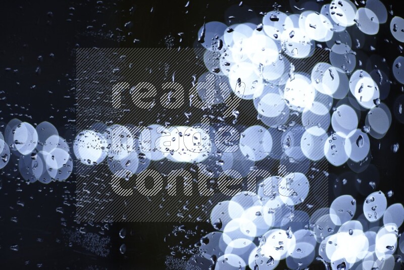 Bokeh light in white with water drops