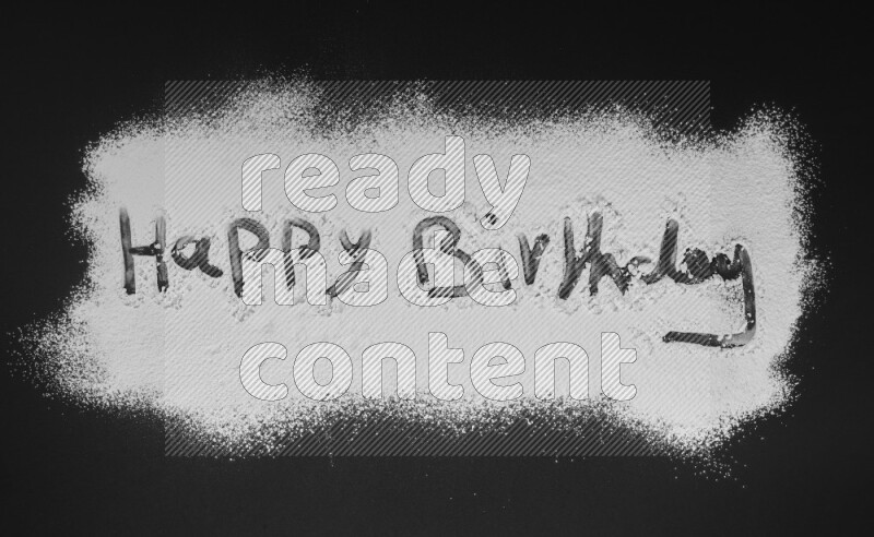 A sentence written with powder on black background