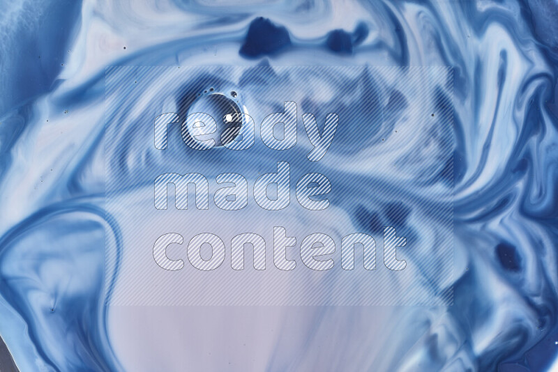 لقطة مقربة لأنماط دوامية باللون الأزرق والأحمر والأبيض