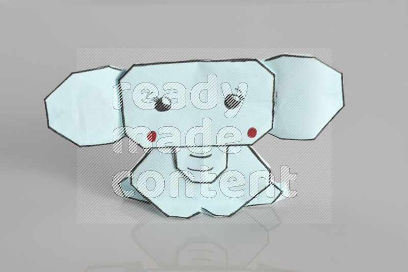 Origami animals on grey background