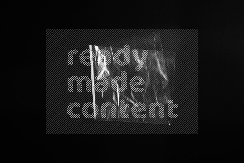 Transparent plastic textures on black background