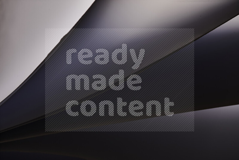 An abstract art piece displaying smooth curves in cold gradients created by colored light