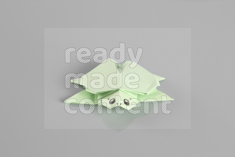 Origami animals on grey background