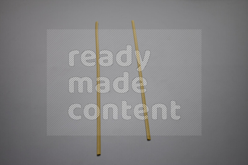 Linguini pasta on grey background