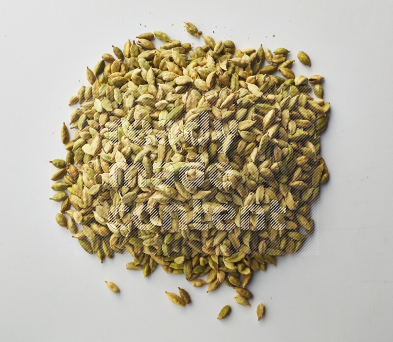 Top-view shot of Cardamon on white background