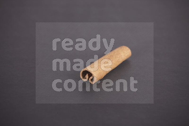 Cinnamon stick on black background