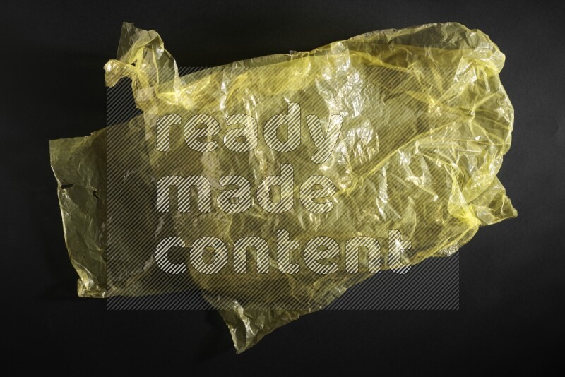 Colored plastic textures on black background