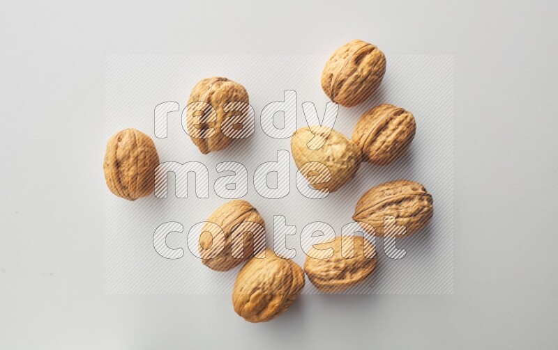 Top-view shot of walnut on white background