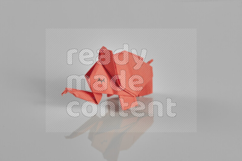 Origami animals on grey background