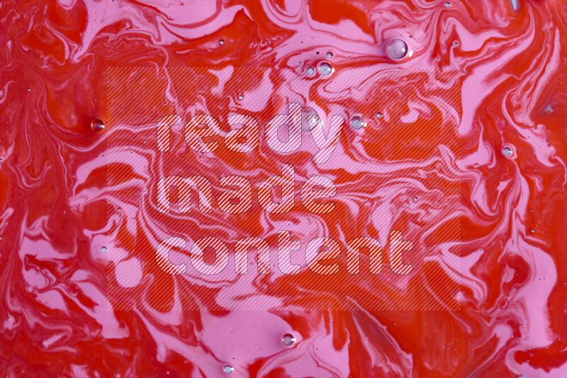 Abstract colorful background with mixed of pink and red paint colors