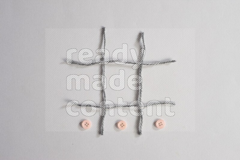 Rose buttons placed on grey background