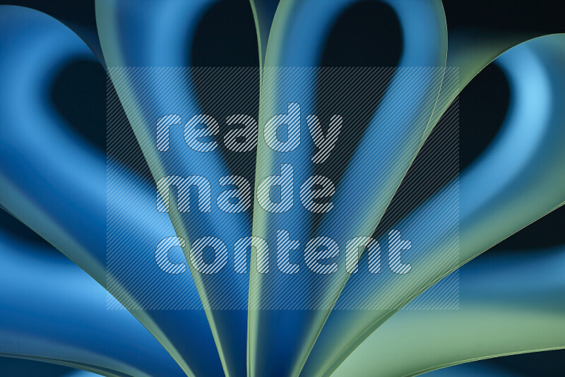 An abstract art piece displaying smooth curves in blue and green gradients created by colored light