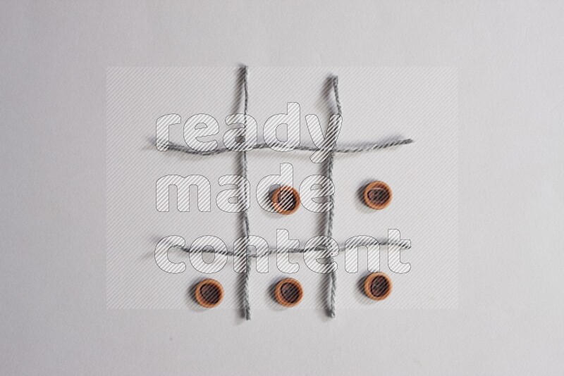 Wooden buttons placed on grey background