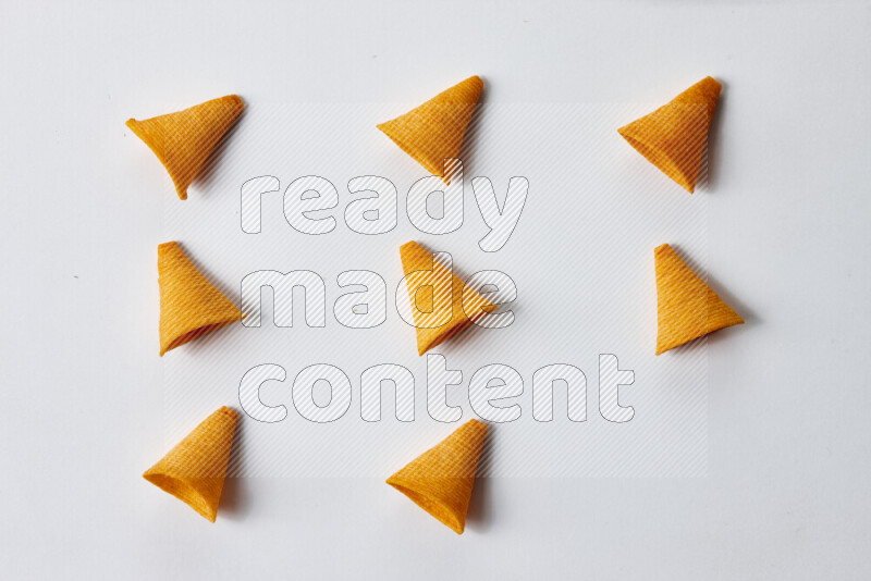 Assorted snacks on white background