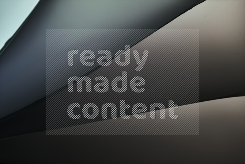 An abstract art piece displaying smooth curves in warm and cold gradients created by colored light