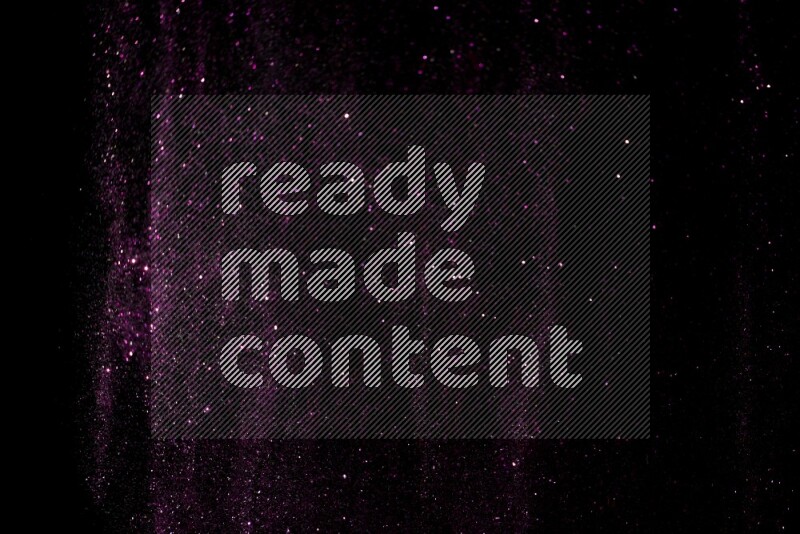 Pink glitter powder isolated on black background