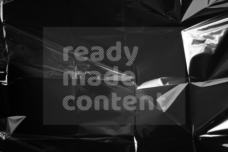 Plastic wrap texture on black background
