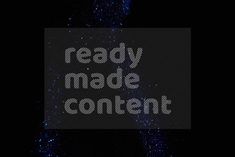 Blue glitter powder isolated on black background
