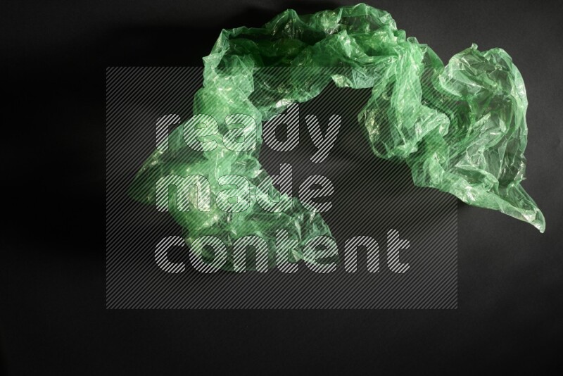 Colored plastic textures on black background