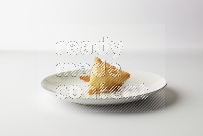 sambosas on a white background