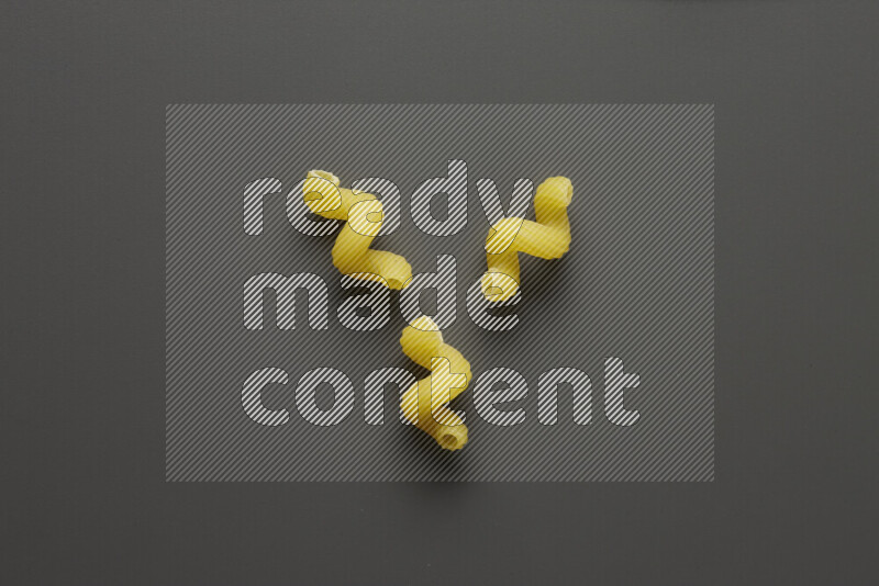 Twist pasta on grey background