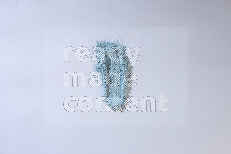 Blue powder smears on white background