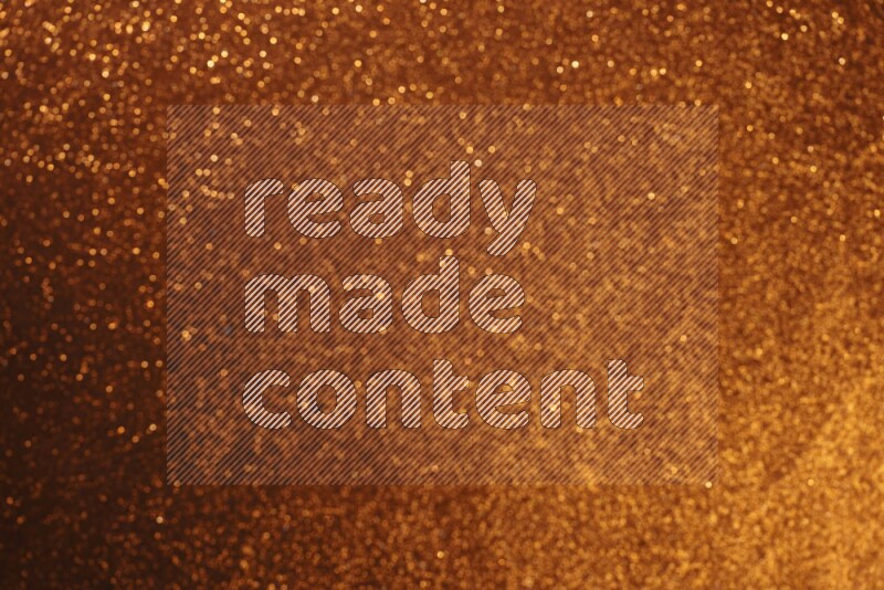 Orange glittery bokeh background