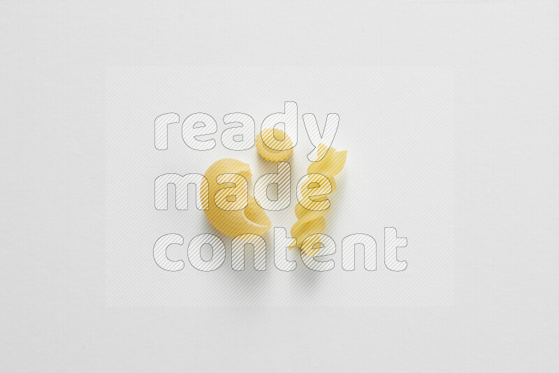 Different pasta types on white background