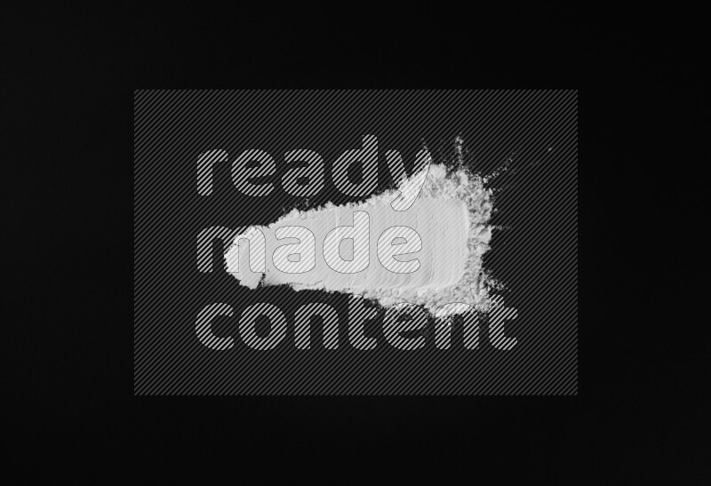 White powder smears on black background