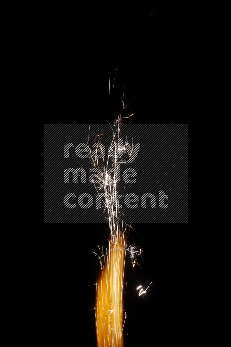 Sparkler candle isolated on black background