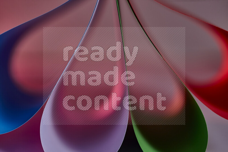 An abstract art piece displaying smooth curves in colorful gradients created by colored light