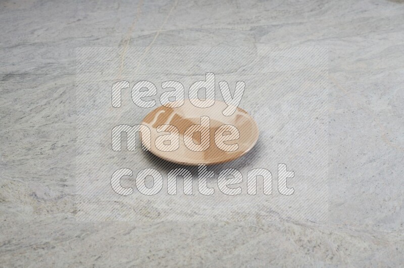 Multicolored Pottery Plate On Grey Marble Flooring