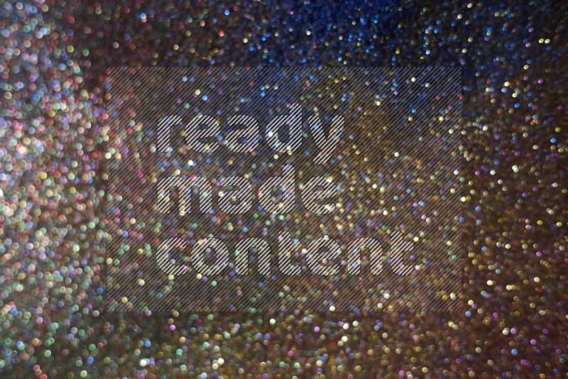 Multicolored glitter powder isolated on black background