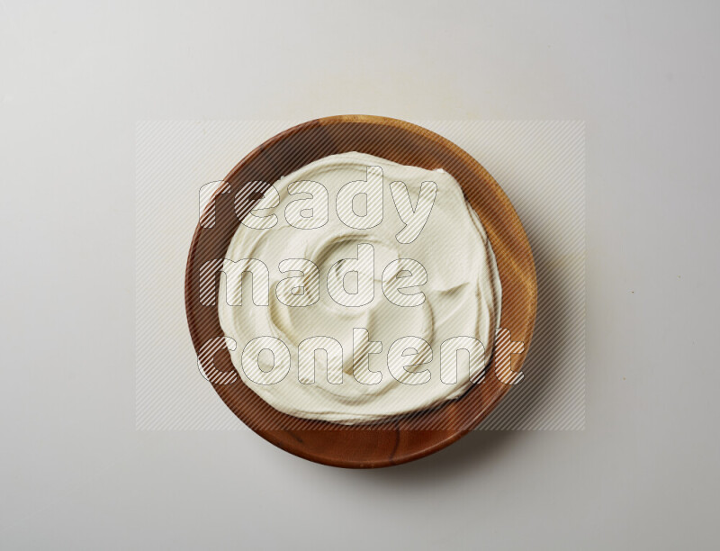 Plain Lebnah in a wooden plate on a white background