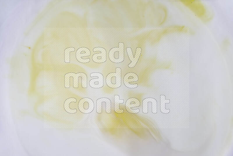 لقطة مقربة لأنماط دوامية باللون الأصفر والأبيض