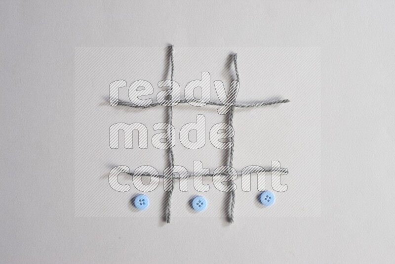 Blue buttons placed on grey background