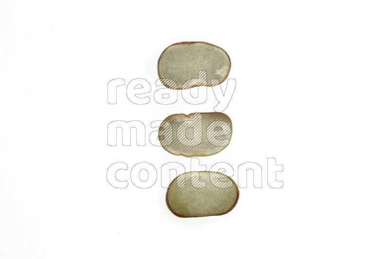 Peach slices on illuminated white background