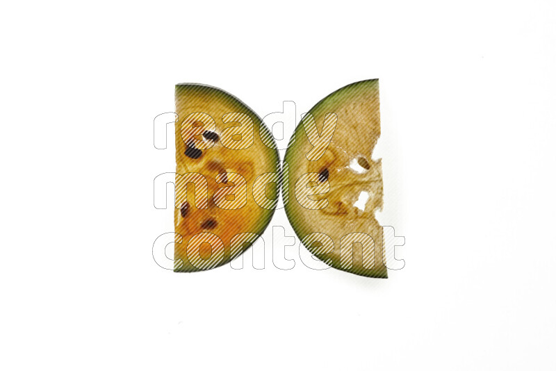 Watermelon slices on illuminated white background