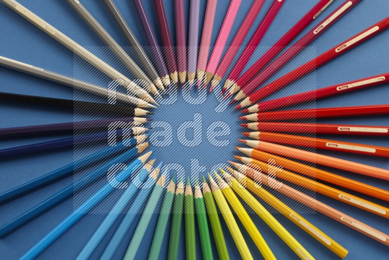 Different school supplies on blue background