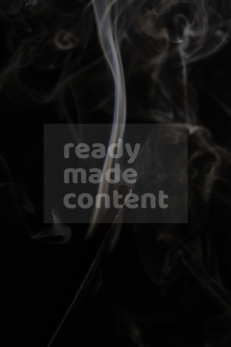 Motion of wavy smoke isolated on dark background