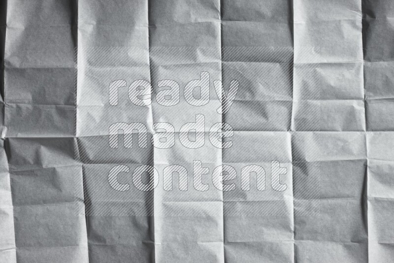White paper sheet on black background