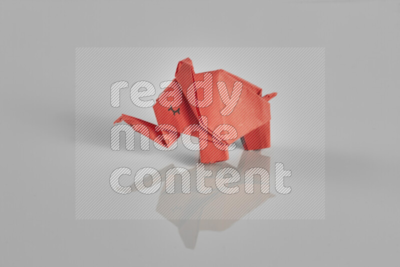 Origami animals on grey background