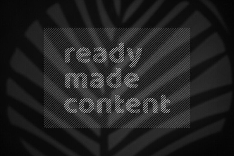 مجموعة من ضوء الغوبو الخافت تظهر أنماط هندسية علي سطح ناعم