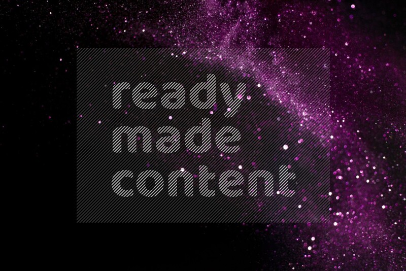 Pink glitter powder isolated on black background