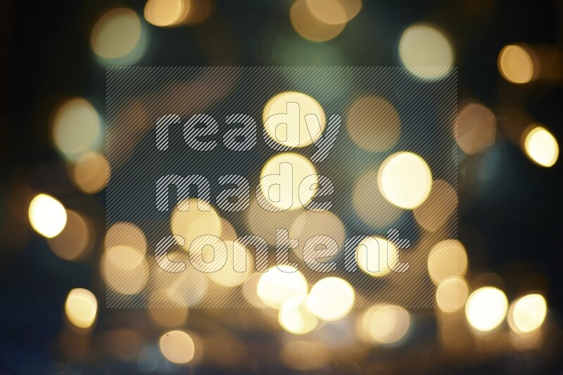 Bokeh light in yellow with blue background