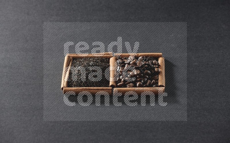2 squares of cinnamon sticks full of coffee beans and tea on black flooring