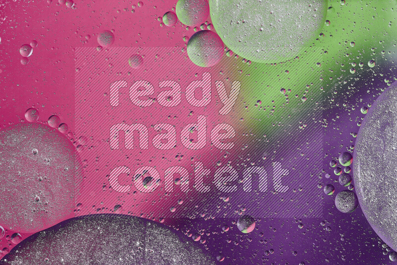 Close-ups of abstract oil bubbles on water surface in shades of purple, green and pink