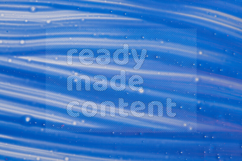 Close-ups of abstract blue paint texture in different shapes