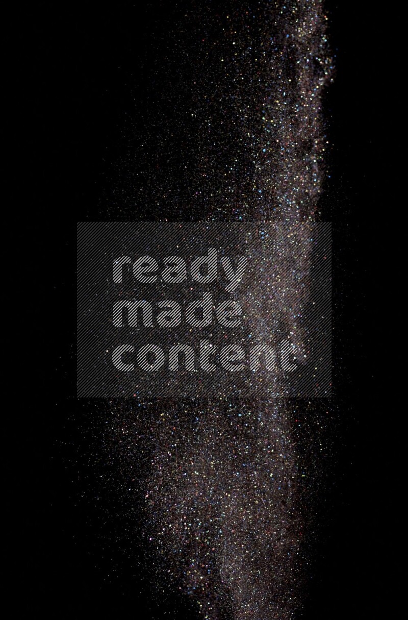 Multicolored glitter powder isolated on black background